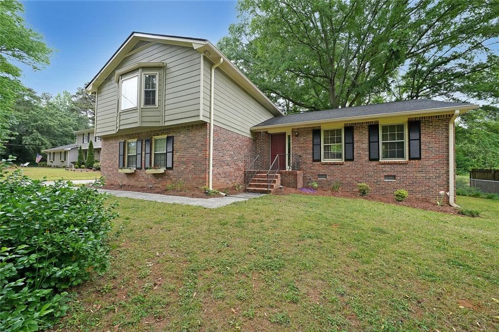 4 bedroom, 3 bathroom single family residence sold at 387 Cascade Drive, Lilburn, GA 30047
