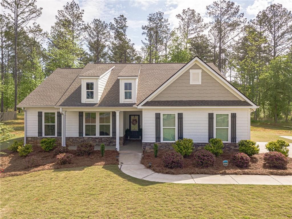 4 bedroom, 3 bathroom single family residence sold at 207 Jim Daws Road, Monroe, GA 30655