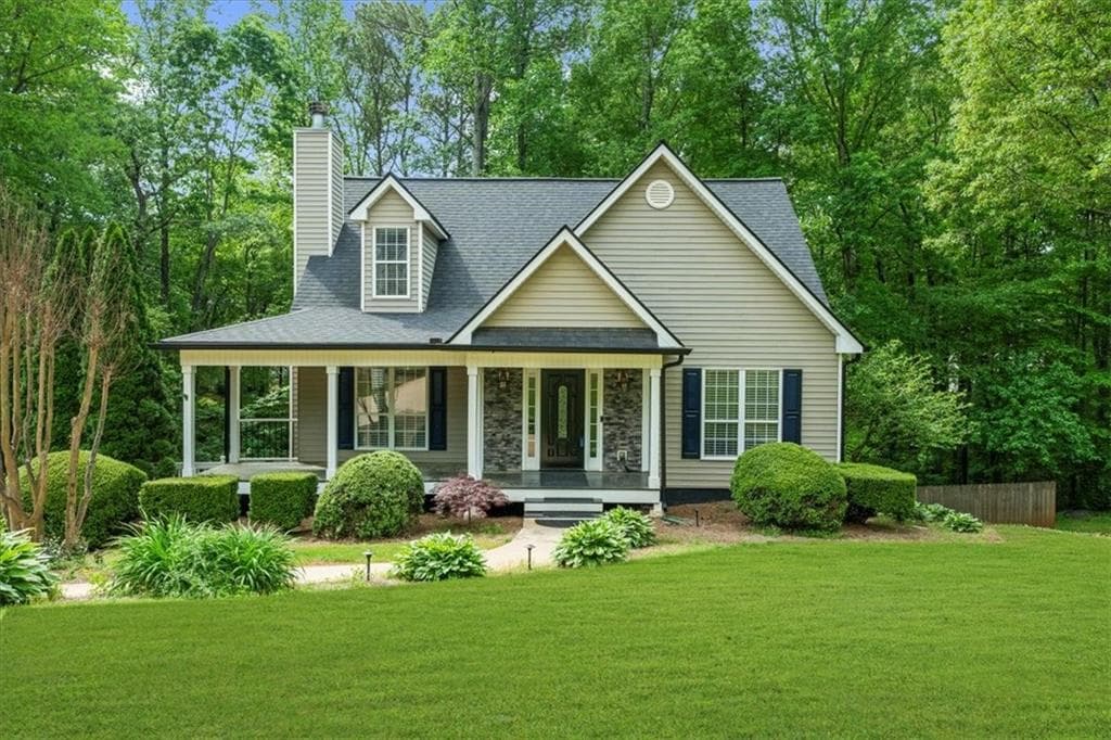 4 bedroom, 3 bathroom single family residence sold at 6715 N Glen Drive, Cumming, GA 30028