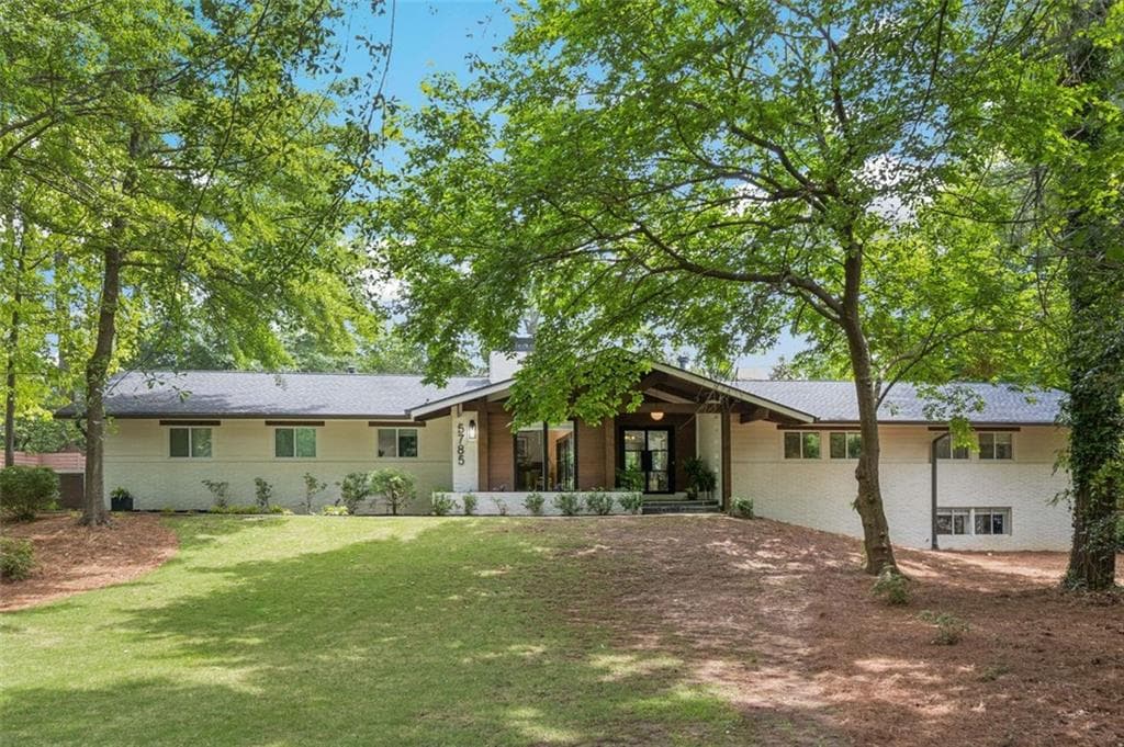 4 bedroom, 5 bathroom single family residence sold at 5785 Timberlane Terrace, Sandy Springs, GA 30328