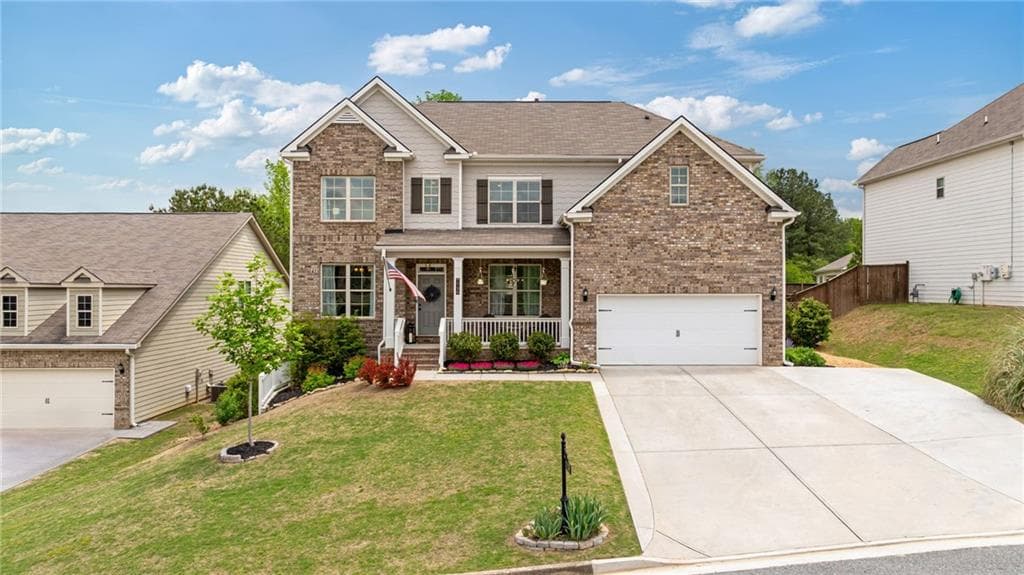 6 bedroom, 4 bathroom, 4,108 sq ft single family residence sold at 7730 Tiberon Parkway, Cumming, GA 30028