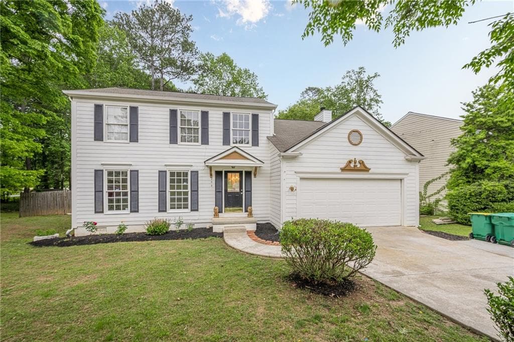 4 bedroom, 3 bathroom single family residence sold at 303 Cimarron Way, Lawrenceville, GA 30044