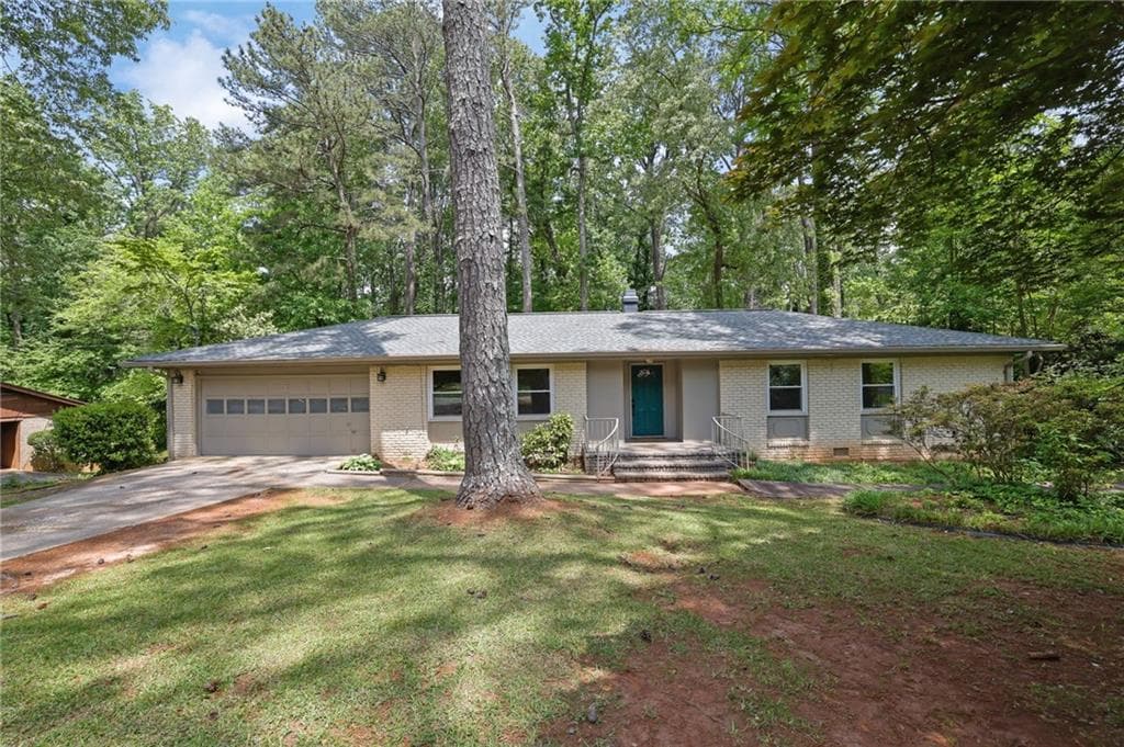 3 bedroom, 2 bathroom, 1,551 sq ft single family residence sold at 4420 Lake Breeze Drive, Stone Mountain, GA 30083