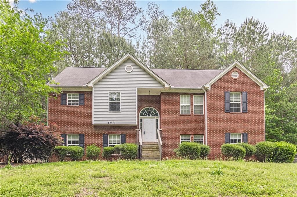 4 bedroom, 3 bathroom single family residence sold at 4671 W Lake Drive, Conyers, GA 30094