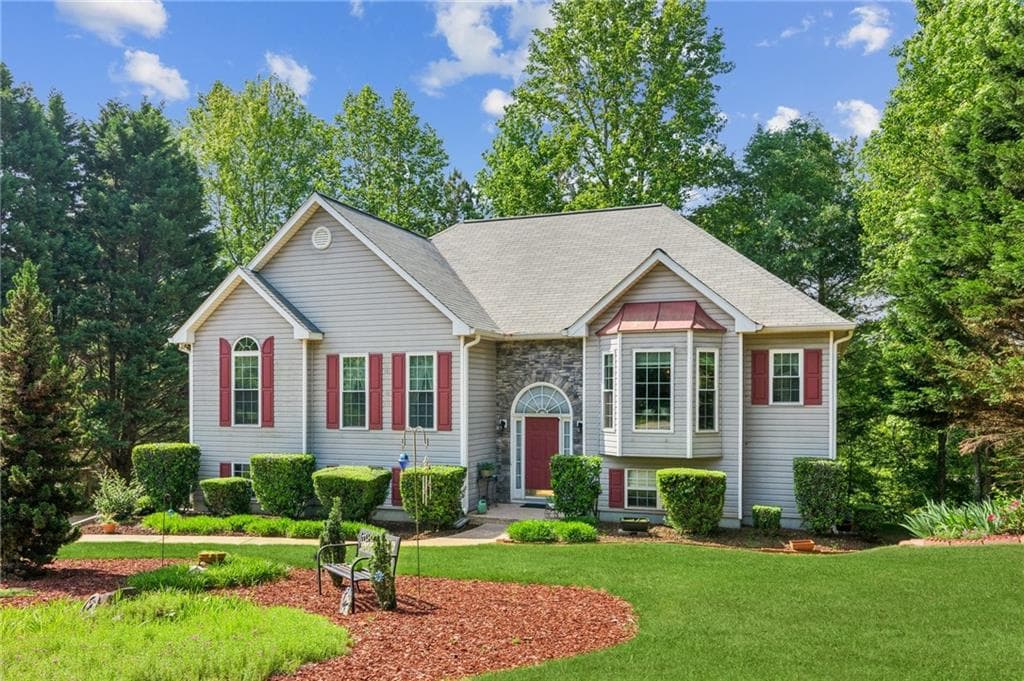 4 bedroom, 3 bathroom single family residence sold at 6990 N Glen Drive, Cumming, GA 30028