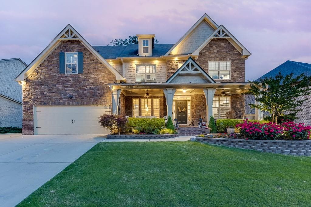 6 bedroom, 5 bathroom single family residence sold at 3939 Soft Wind Terrace, Buford, GA 30518