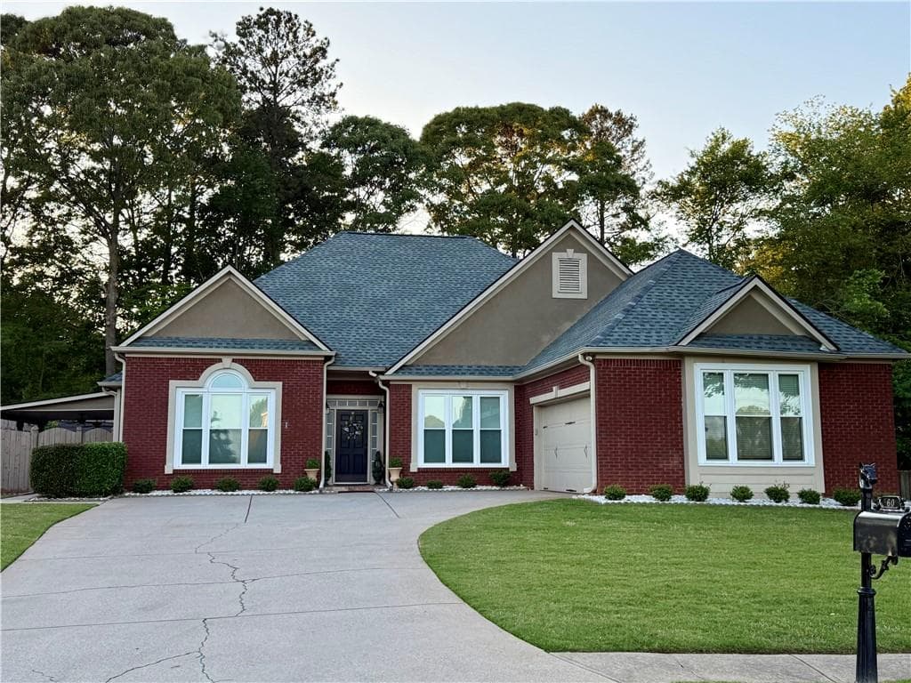4 bedroom, 3 bathroom single family residence sold at 60 Saddle Tree Way, Sugar Hill, GA 30518