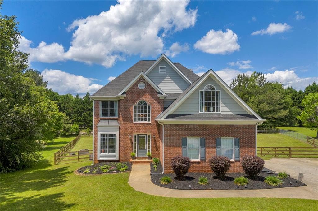 4 bedroom, 3 bathroom, 2,047 sq ft single family residence sold at 3135 Castlewood Drive, Loganville, GA 30052