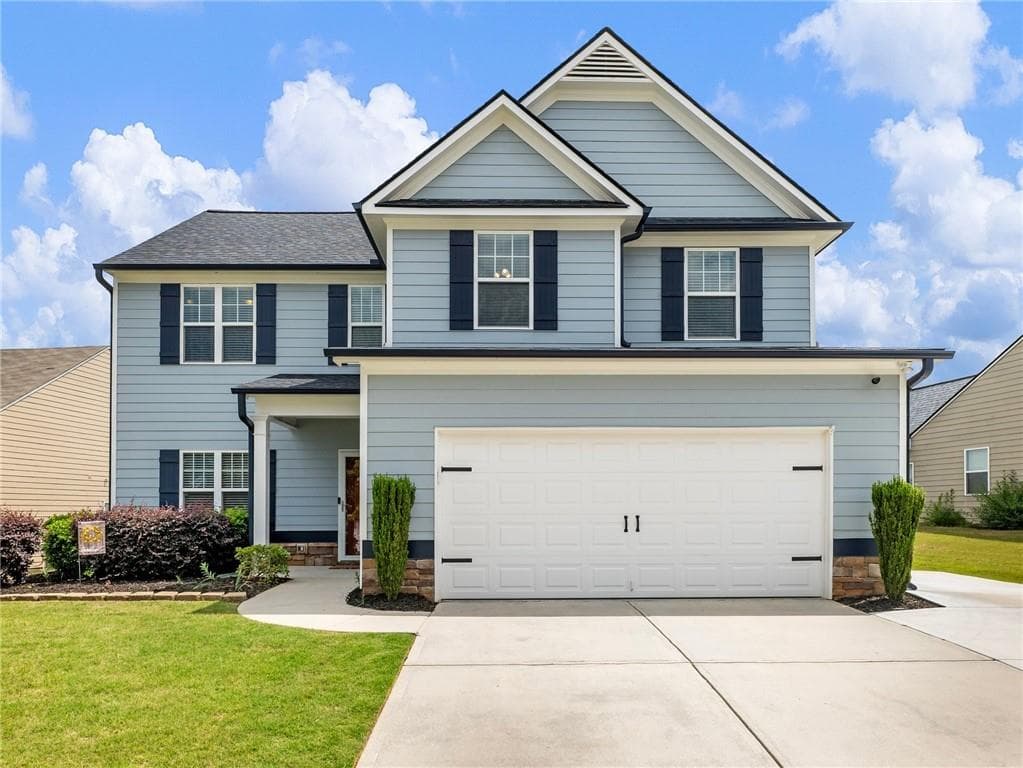 4 bedroom, 3 bathroom single family residence sold at 1312 Old Glory Court, Hoschton, GA 30548