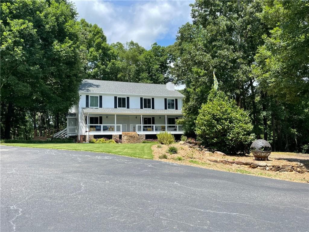 5 bedroom, 4 bathroom, 4,908 sq ft single family residence sold at 1510 Skelton Road, Hoschton, GA 30548