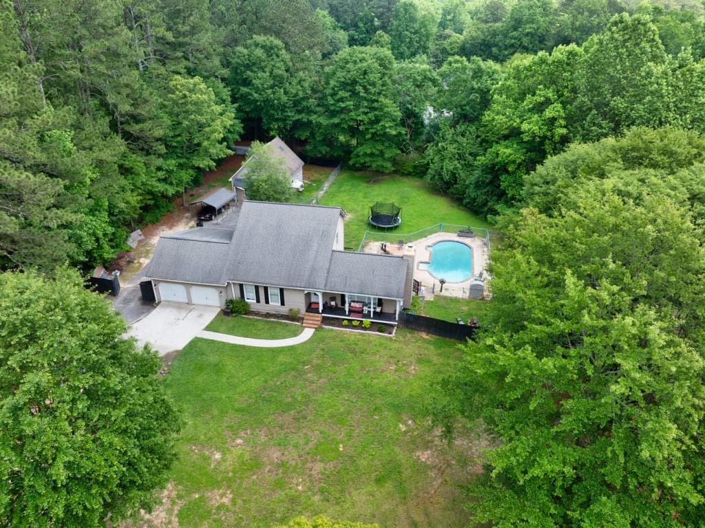4 bedroom, 3 bathroom single family residence sold at 955 Chandler Haulk Road, Loganville, GA 30052