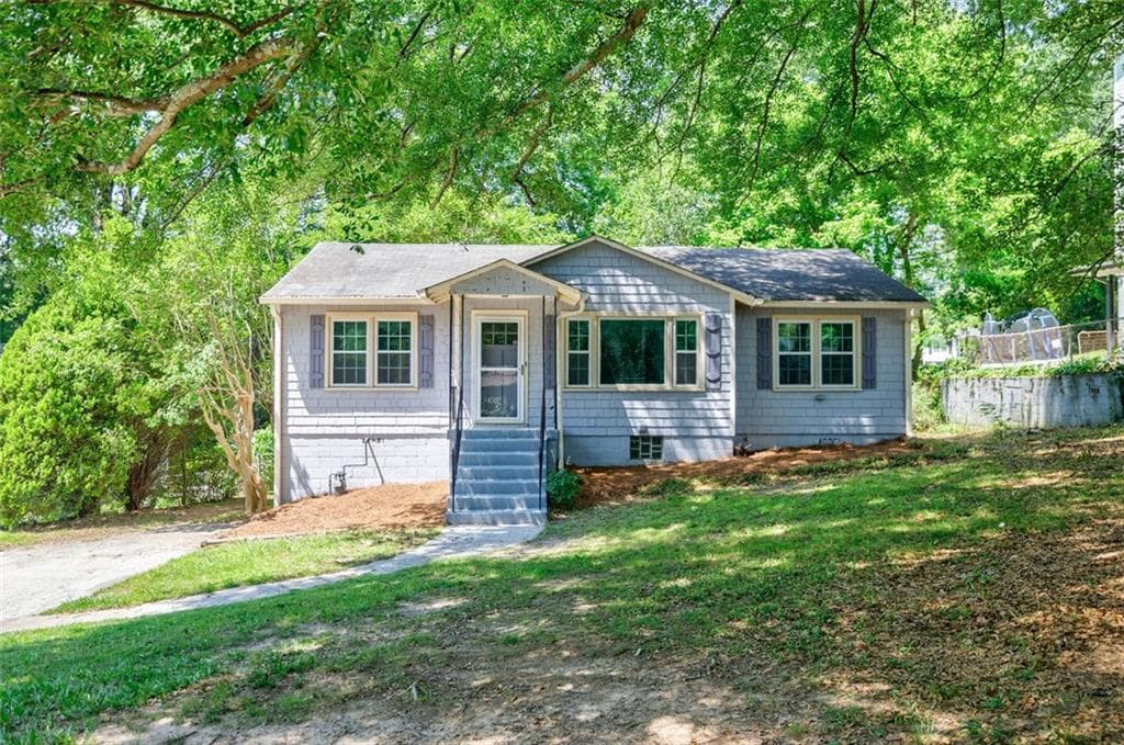 4 bedroom, 2 bathroom, 1,633 sq ft single family residence sold at 1716 BEACON HILL Boulevard, Atlanta, GA 30329