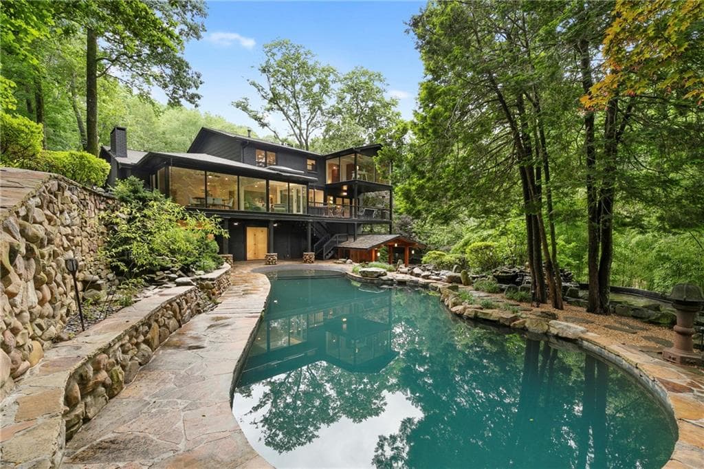5 bedroom, 5 bathroom, 4,629 sq ft single family residence sold at 4601 Tall Pines Drive, Atlanta, GA 30327