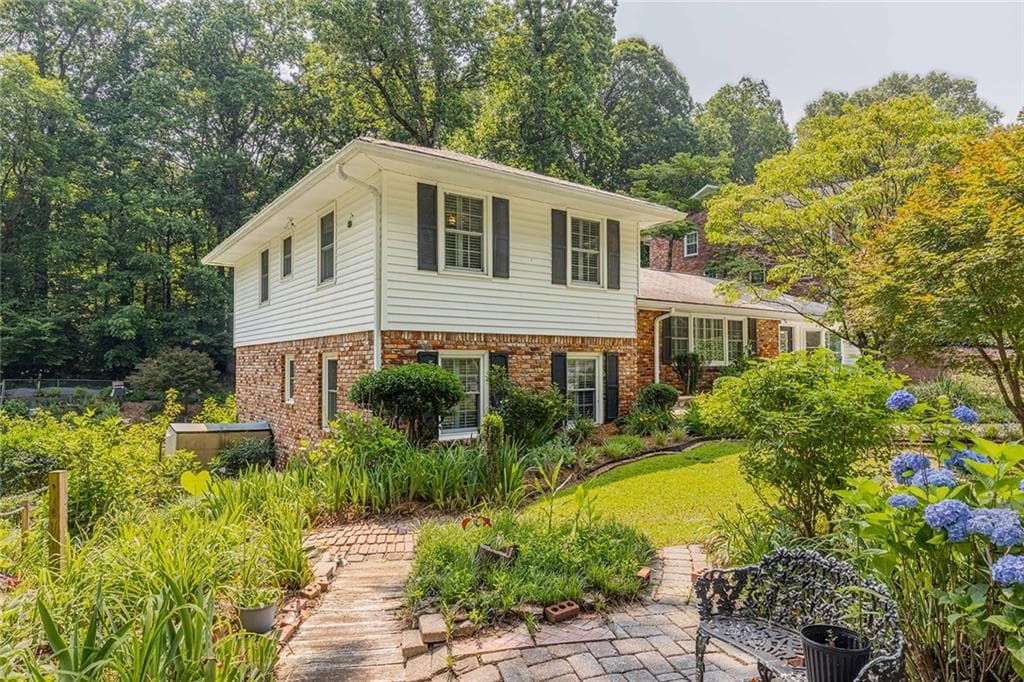4 bedroom, 2 bathroom, 3,848 sq ft single family residence sold at 6825 Castleton Drive, Atlanta, GA 30328