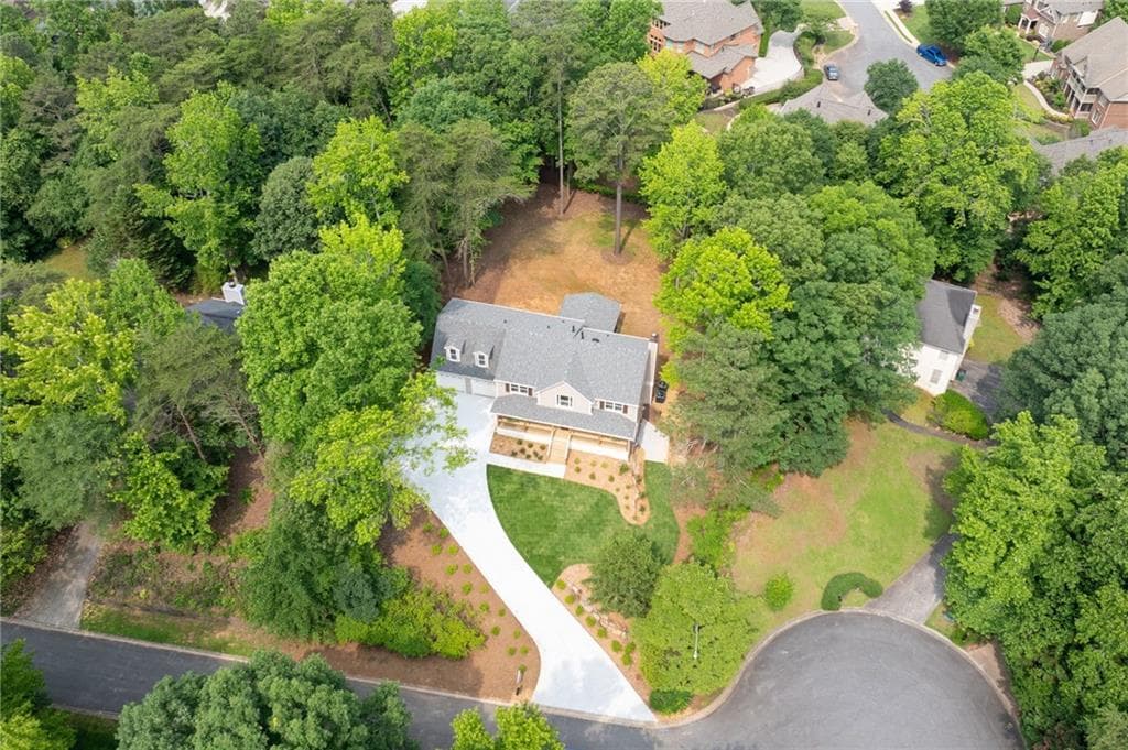 5 bedroom, 4 bathroom, 3,558 sq ft single family residence sold at 3702 Running Fox Drive, Marietta, GA 30062