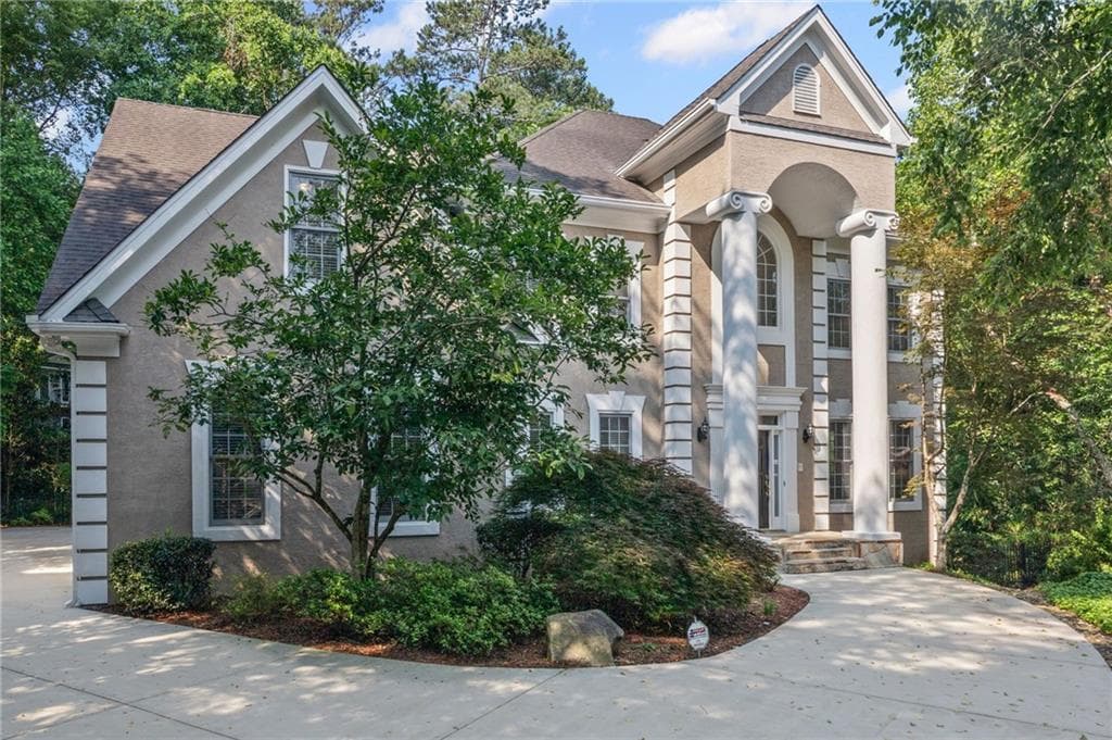 5 bedroom, 6 bathroom, 5,247 sq ft single family residence sold at 310 Ivy Brooke Court, Atlanta, GA 30342