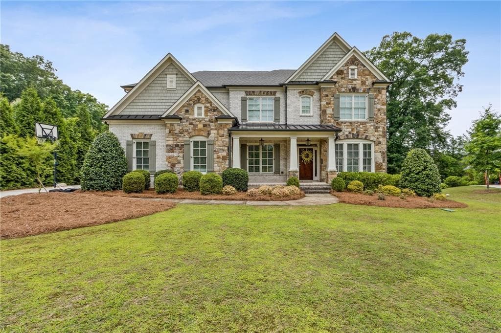 6 bedroom, 5 bathroom, 6,099 sq ft single family residence sold at 10 Nesbit Reserve Court, Atlanta, GA 30350
