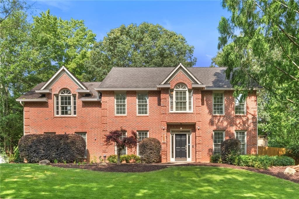 4 bedroom, 3 bathroom, 3,107 sq ft single family residence sold at 100 Parkerwood Way, Alpharetta, GA 30022