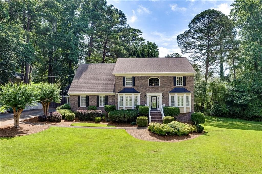 5 bedroom, 3 bathroom, 3,651 sq ft single family residence sold at 1324 Concord Circle, Lilburn, GA 30047