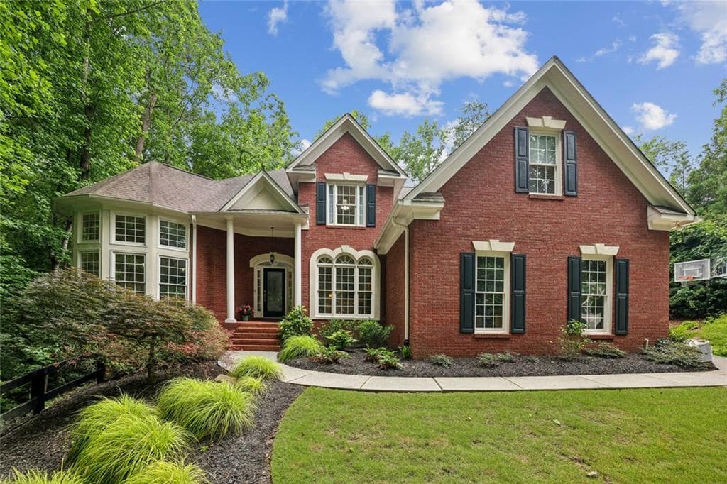 6 bedroom, 6 bathroom, 5,250 sq ft single family residence sold at 770 Spalding Heights Drive, Atlanta, GA 30350