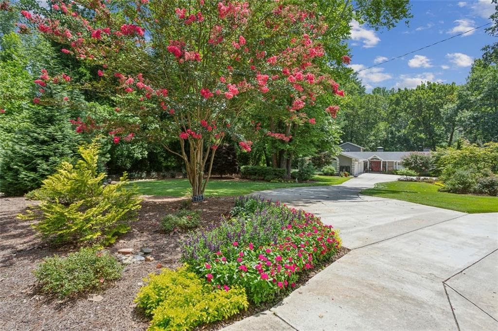 4 bedroom, 4 bathroom, 3,430 sq ft single family residence sold at 750 Crest Valley Drive, Sandy Springs, GA 30327