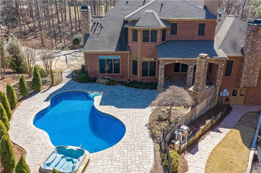6 bedroom, 8 bathroom, 6,182 sq ft single family residence sold at 297 Collegiate Drive, Powder Springs, GA 30127