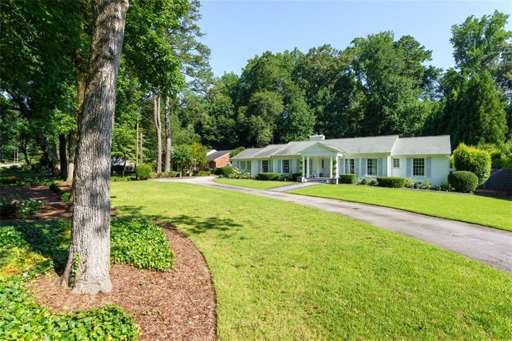 5 bedroom, 4 bathroom, 3,793 sq ft single family residence sold at 4095 N Broadland Road, Atlanta, GA 30342