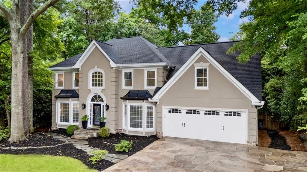 5 bedroom, 3 bathroom, 4,646 sq ft single family residence sold at 910 Kings Arms Way, Johns Creek, GA 30022