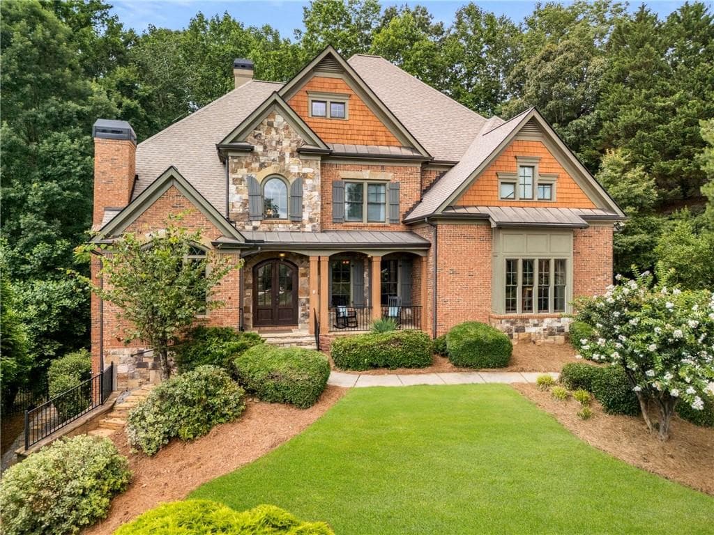 7 bedroom, 8 bathroom, 7,200 sq ft single family residence sold at 908 Basingstoke Court, Suwanee, GA 30024