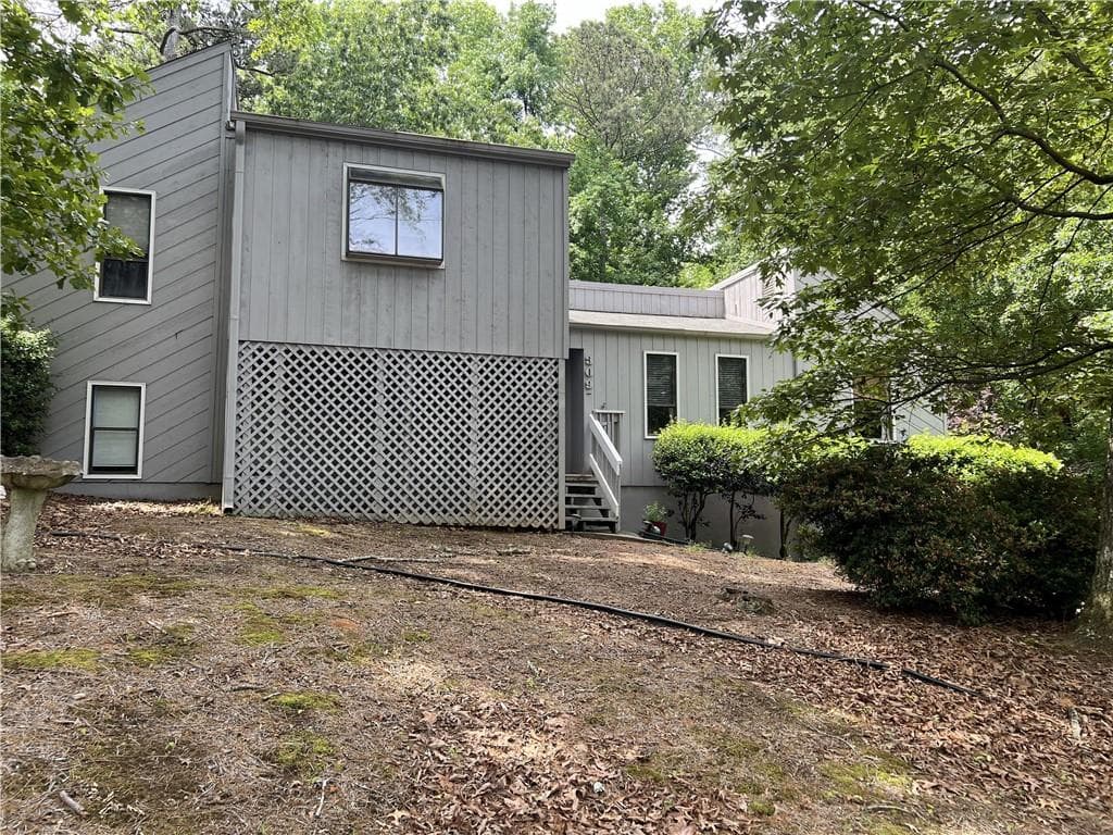 4 bedroom, 3 bathroom, 2,208 sq ft single family residence sold at 3090 Alberta Drive, Marietta, GA 30062