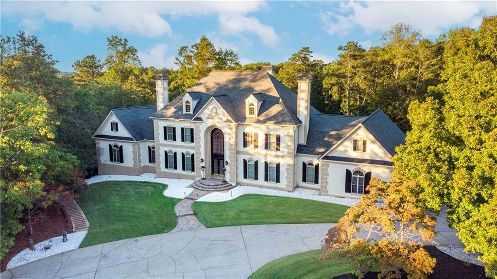 7 bedroom, 8 bathroom, 13,272 sq ft single family residence sold at 1806 Wynthrop Manor Drive, Marietta, GA 30064