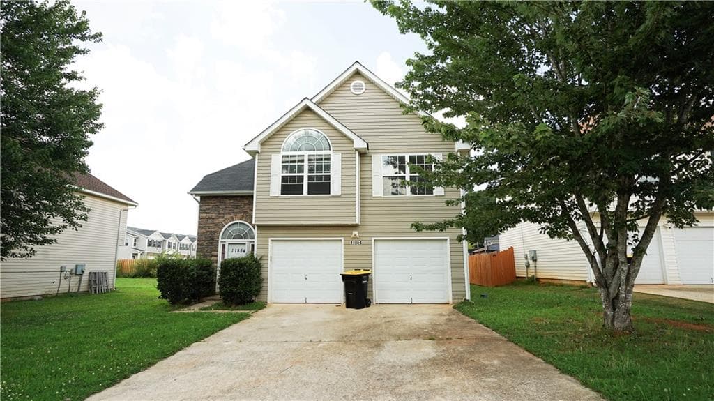 4 bedroom, 3 bathroom, 2,296 sq ft single family residence for sale at 11854 Registry Boulevard, Hampton, GA 30228