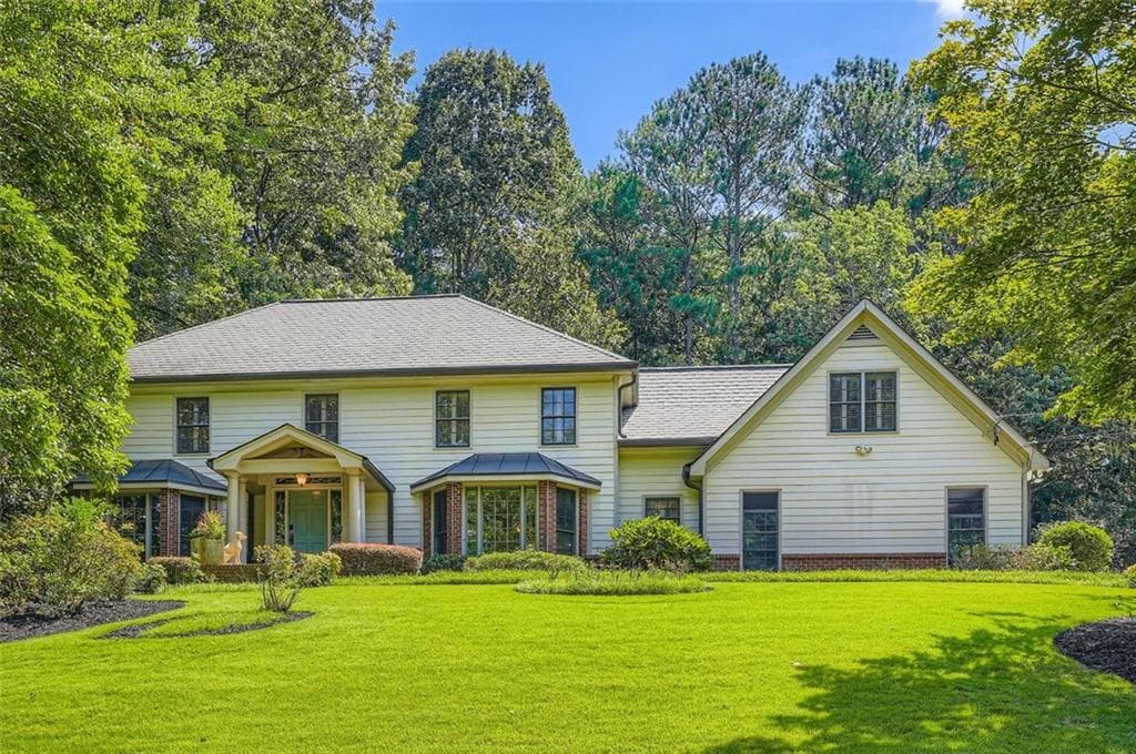 3 bedroom, 4 bathroom, 3,412 sq ft single family residence sold at 5475 E IDLEWOOD Lane, Sandy Springs, GA 30327