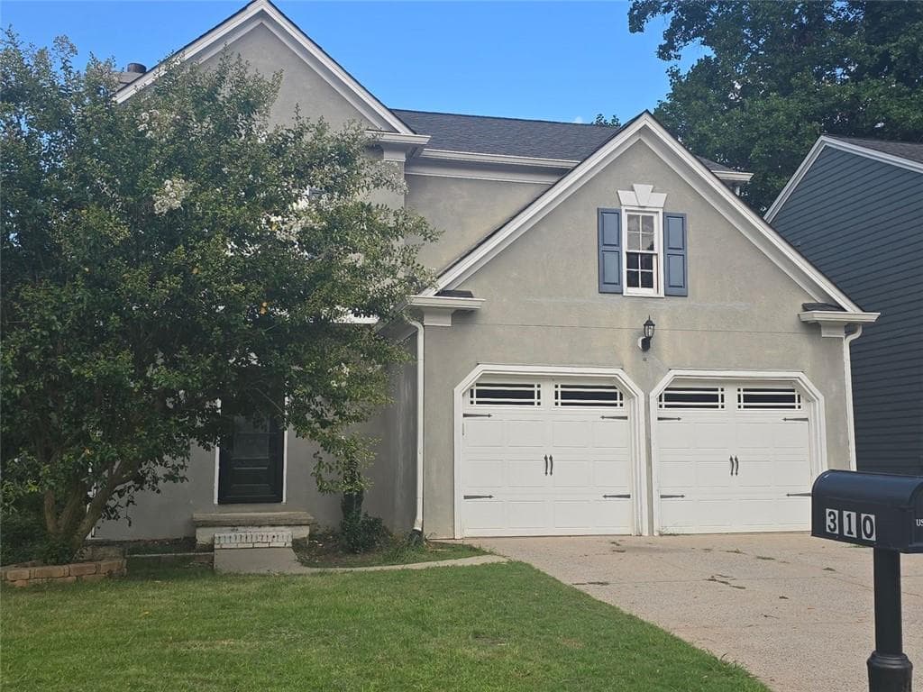 4 bedroom, 4 bathroom, 2,128 sq ft single family residence sold at 310 AVEBURY Court, Johns Creek, GA 30022
