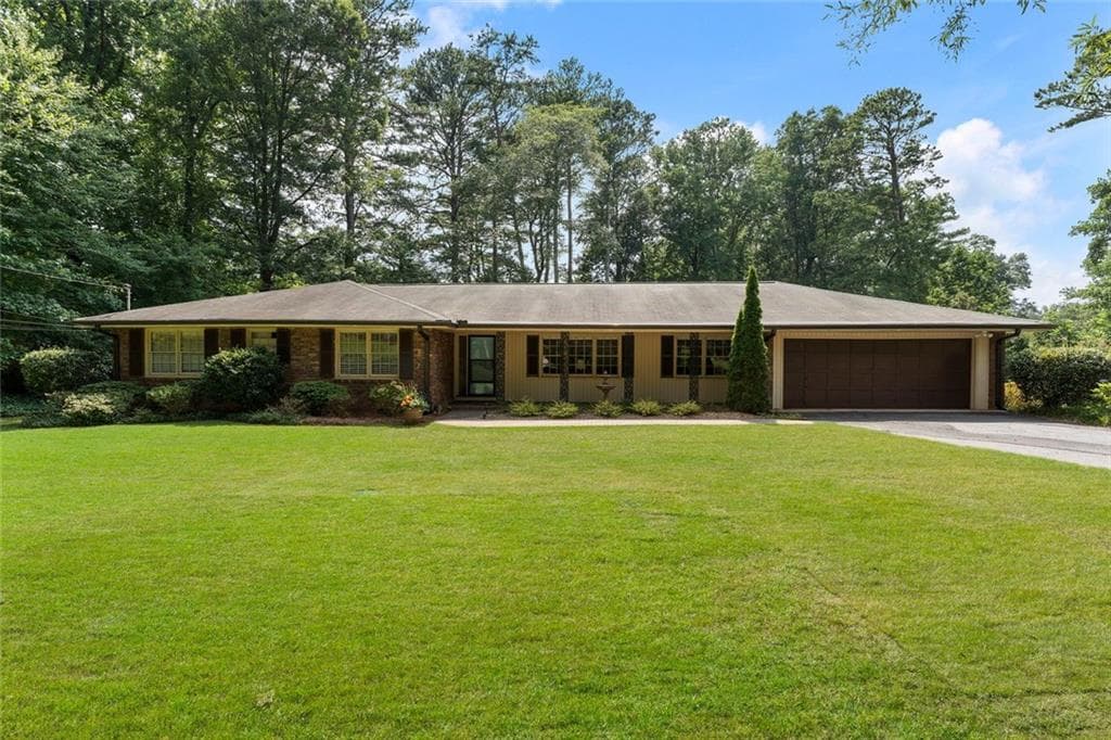 5 bedroom, 4 bathroom, 3,745 sq ft single family residence sold at 1553 Congress Circle, Dunwoody, GA 30338