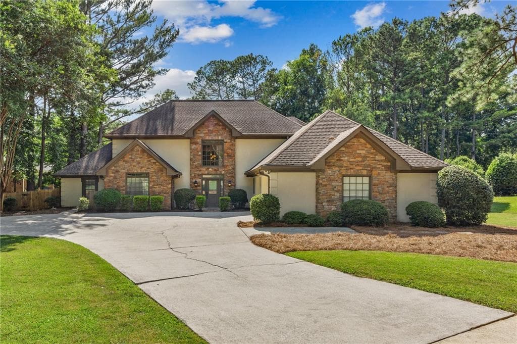 4 bedroom, 4 bathroom, 3,868 sq ft single family residence sold at 5380 Bannergate Drive, Johns Creek, GA 30022