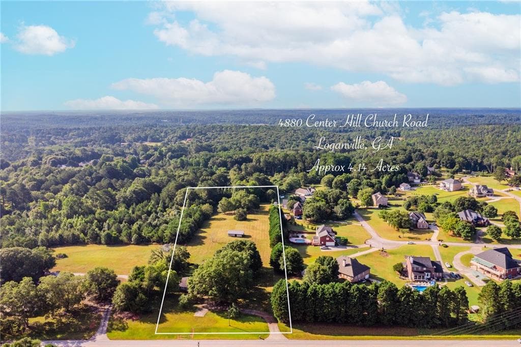 3 bedroom, 2 bathroom, 3,342 sq ft single family residence sold at 4880 Center Hill Church Road, Loganville, GA 30052