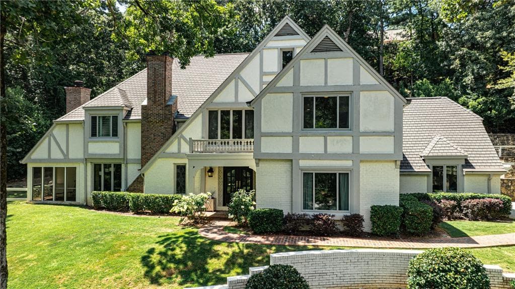 5 bedroom, 6 bathroom, 7,179 sq ft single family residence sold at 5755 Heards Forest Drive, Atlanta, GA 30328