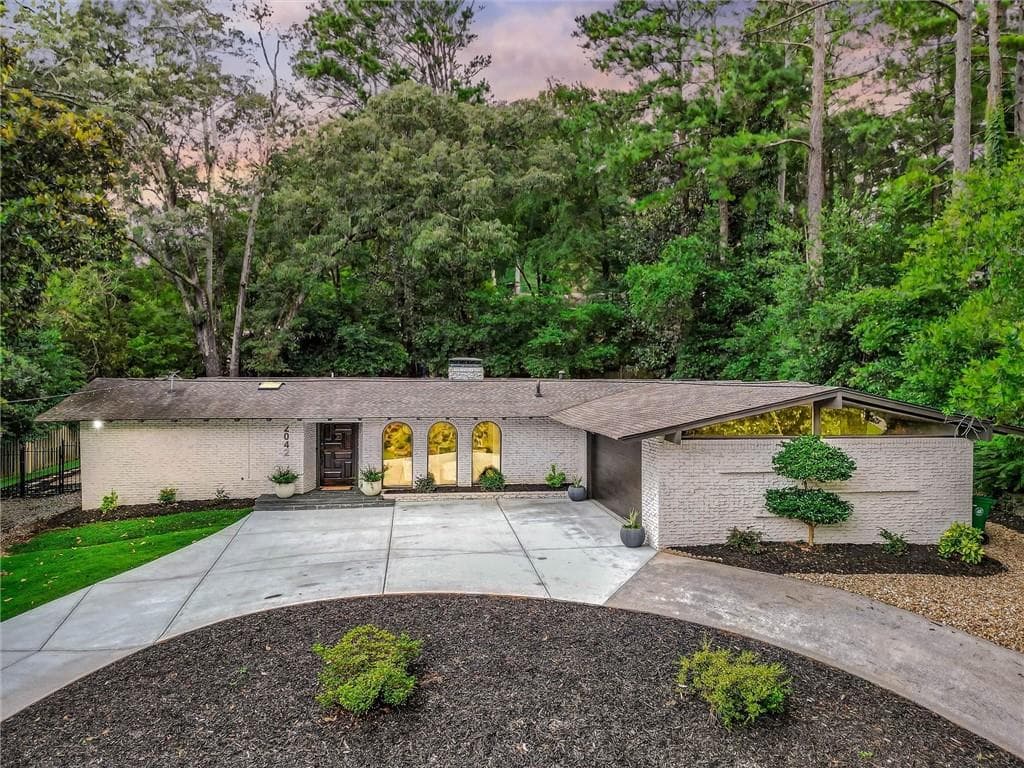 4 bedroom, 3 bathroom, 3,646 sq ft single family residence sold at 2042 Amberwood Way, Atlanta, GA 30345