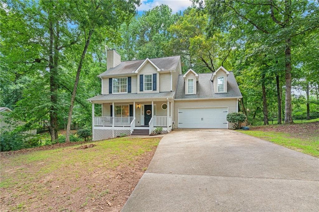 4 bedroom, 3 bathroom, 1,856 sq ft single family residence sold at 7065 Wessex Way, Cumming, GA 30028