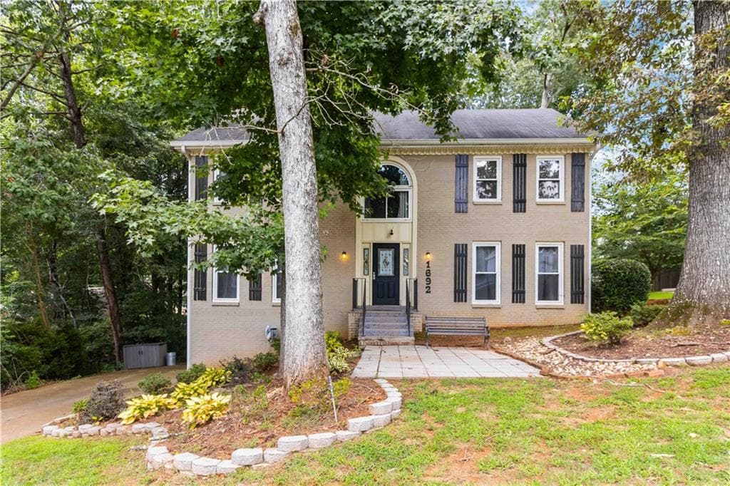 6 bedroom, 4 bathroom, 3,562 sq ft single family residence sold at 1692 Windsor Chase Court, Lawrenceville, GA 30043