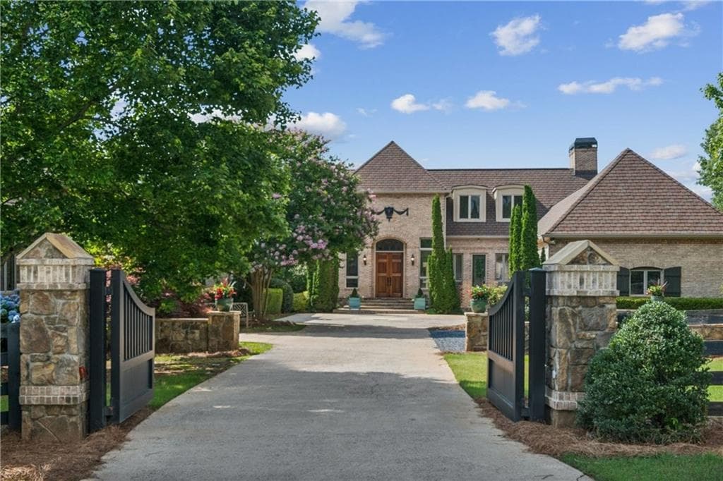 7 bedroom, 6 bathroom, 10,317 sq ft single family residence sold at 4935 Stablegate Court, Cumming, GA 30028