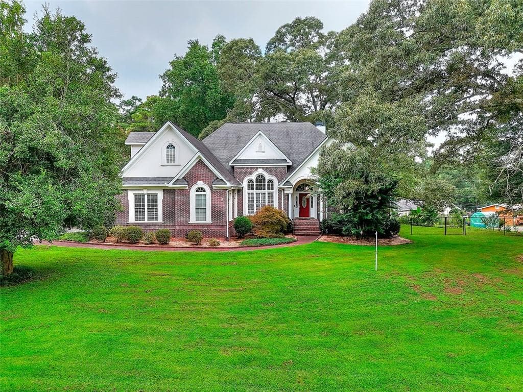 1595 Lake Lucerne Rd, Lilburn, GA 30047 — most recent listing photo