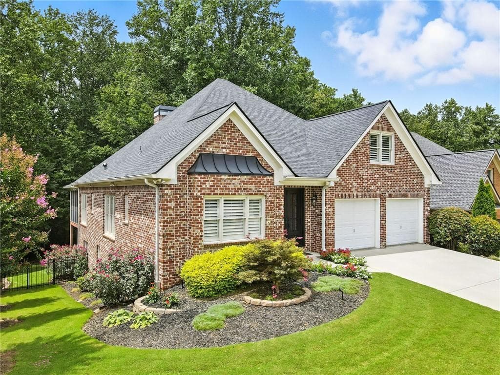 5 bedroom, 5 bathroom, 5,002 sq ft single family residence sold at 1095 Grace Hill Drive, Roswell, GA 30075