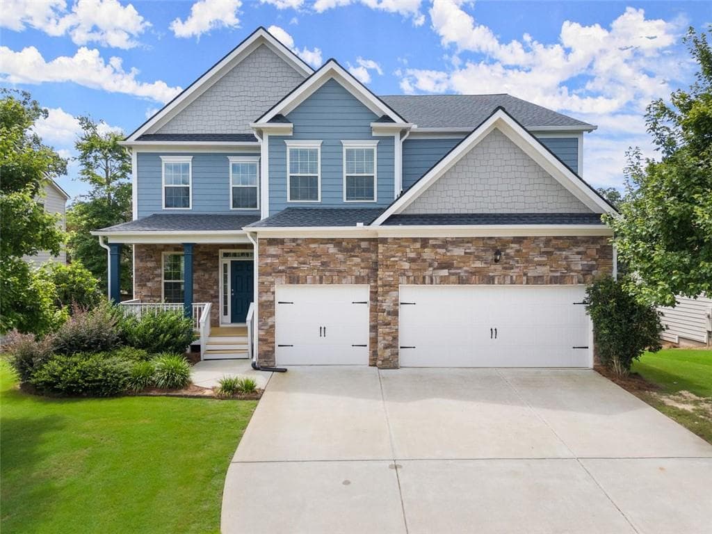 6 bedroom, 4 bathroom, 4,101 sq ft single family residence sold at 4960 Plainsman Circle, Cumming, GA 30028
