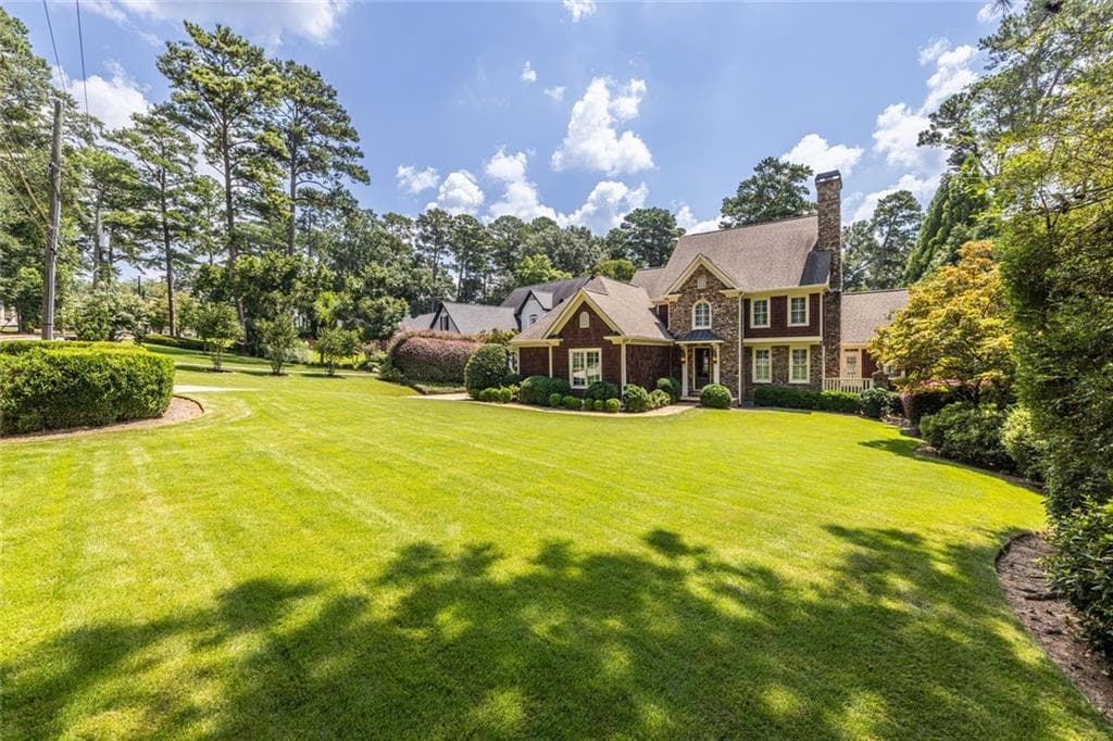 5 bedroom, 6 bathroom, 5,476 sq ft single family residence sold at 1403 Sheridan Road, Atlanta, GA 30324