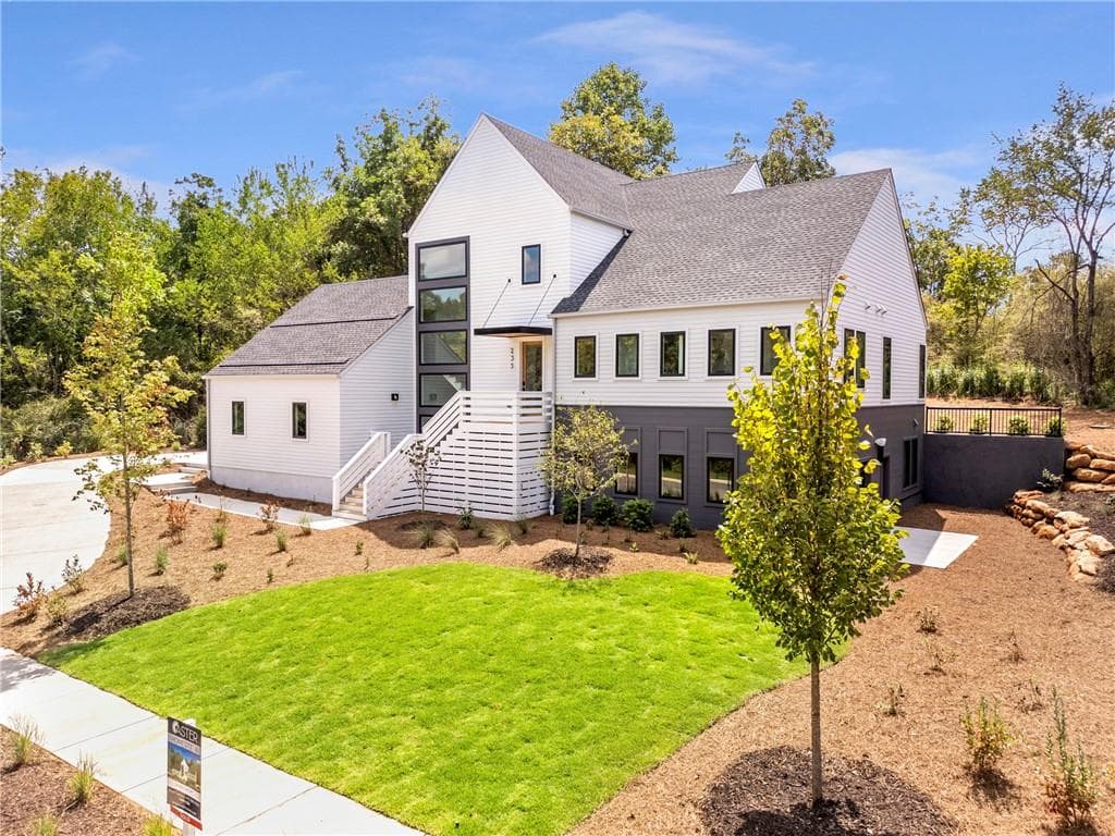 4 bedroom, 5 bathroom, 4,915 sq ft single family residence sold at 235 Winterberry Way, Roswell, GA 30075