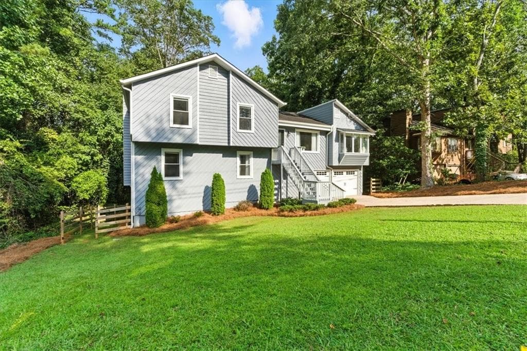 4 bedroom, 3 bathroom, 2,236 sq ft single family residence sold at 5100 Ravenwood Drive, Marietta, GA 30066