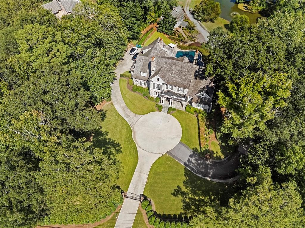 6 bedroom, 9 bathroom, 11,950 sq ft single family residence sold at 4975 Peachtree Dunwoody Road, Atlanta, GA 30342