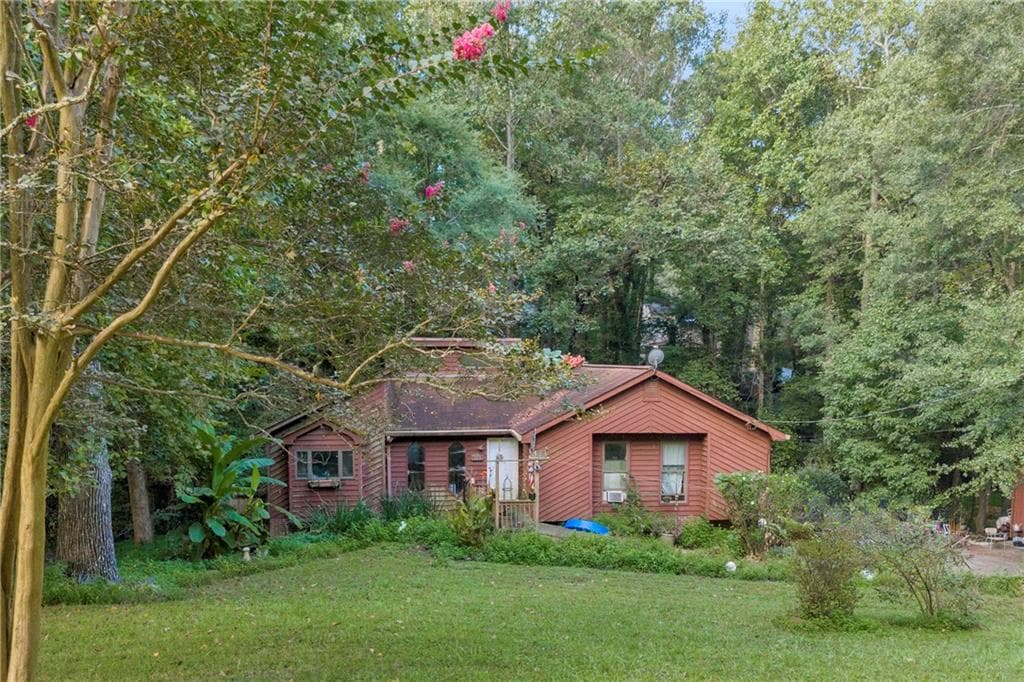 4 bedroom, 3 bathroom, 1,558 sq ft single family residence sold at 1373 Fairfield Drive, Lilburn, GA 30047